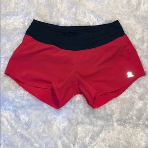 Like new Oiselle roga shorts size 6 pink and navy